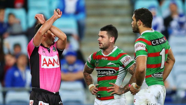Man in charge: Gerard Sutton places Adam Reynolds on report in round 25 of this year's NRL competition.