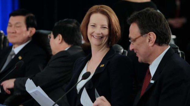 Progress ... Prime Minister Julia Gillard and Trade Minister Craig Emerson at APEC.
