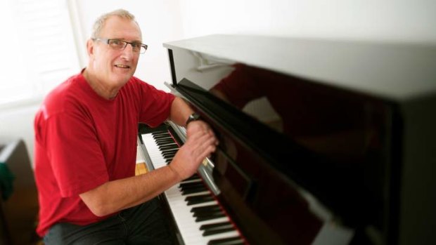 Learning the piano has helped Graeme Holdsworth recover.