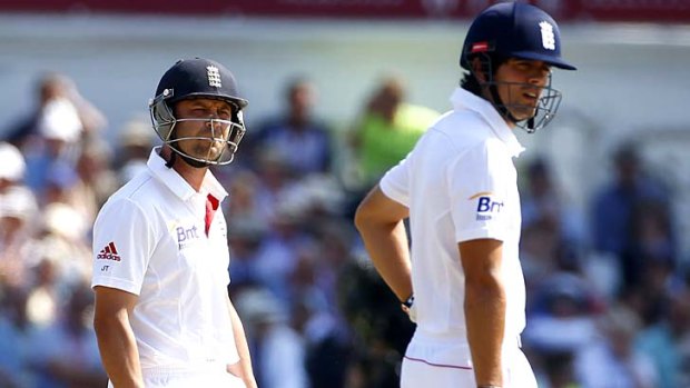 The moment: England's Jonathan Trott awaits a review of his dismissal.