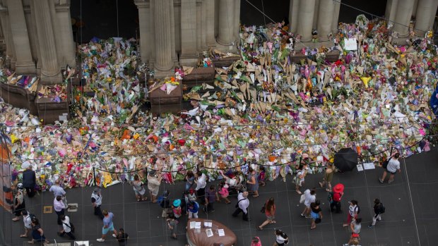 The makeshift floral memorial that appeared on Bourke Street for the victims of the attack.