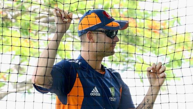 Michael Clarke looks on during an Australian nets session at the Cricket Australia Centre of Excellence in Brisbane.
