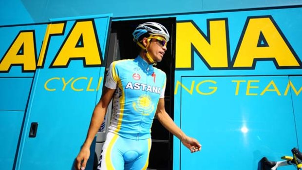 Alberto Contador leaves his team bus before participating in a training session on the first of the two rest days.
