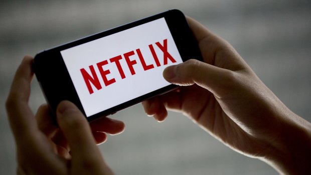 Netflix says it caps speeds to limit charges for users going over their data limits.