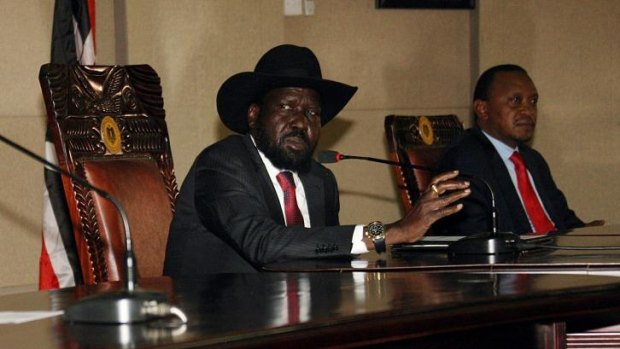 South Sudanese President Salva Kiir, left,  with his Kenyan counterpart Uhuru Kenyatta during peace talks on Boxing Day at Mr Kiir's office in Juba.