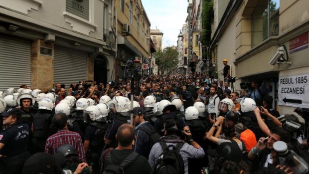 Protesters are confronted by riot police on May 31, 2014, as they try to reach Taksim Square to mark the first anniversary of the 2013 Gezi Park protests.