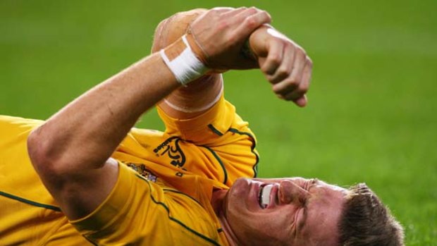Rob Horne grimaces in pain after being tackled against South Africa last week.