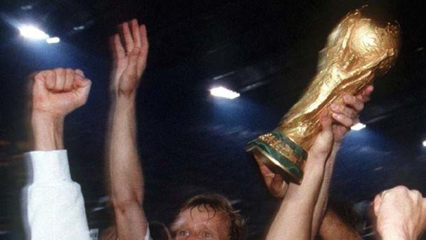 Outspoken ... Lothar Matthaus, right, lifts the World Cup in 1990.