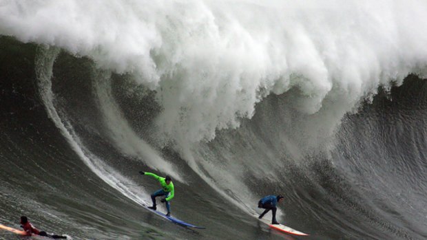 A file image of surfers Greg Long, left, and Jamie Sterling during the 2008 Mavericks surf contest in Half Moon Bay, California.
