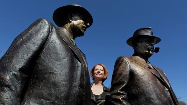 Prime Minister Julia Gillard with sculptures of wartime prime minister John Curtin and his then treasurer and subsequent prime minister Ben Chifley, whose famous light on the hill speech encapsulates what is missing from today's political discourse.