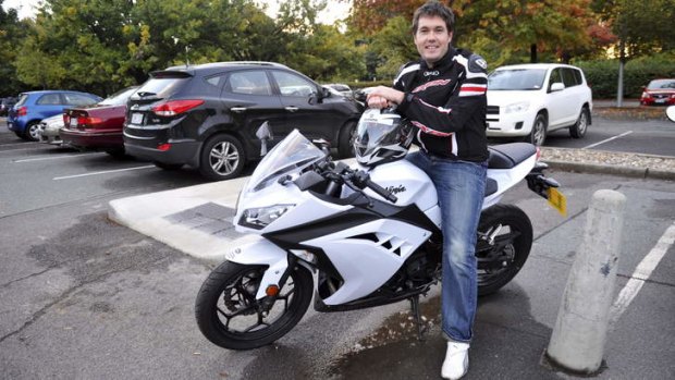 On your bike: Public servant, Nathan O'Brien, of Nicholls, has recently bought a motorcycle to avoid Parliamentary Triangle parking fees.