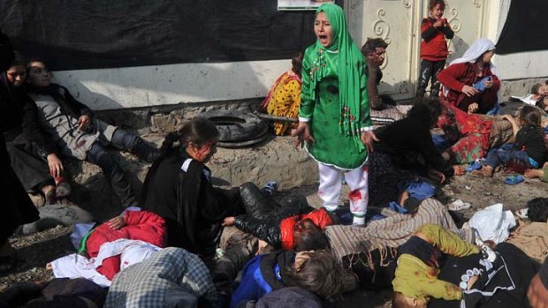 Living hell ... Massoud Hossaini won the  Pulitzer prize for breaking news photograph for this photo of   12-year-old Tarana Akbari crying after explosions during a religious ceremony in Kabul.