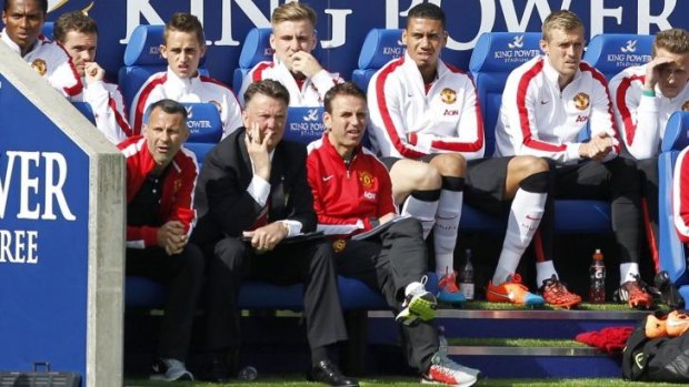 Defeated: Man Utd boss Louis van Gaal watches on from the bench.
