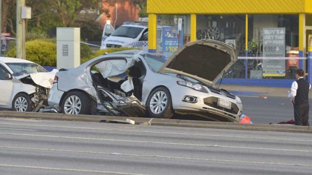 Destruction: Cars severely damaged in a fatal crash in Oakleigh.