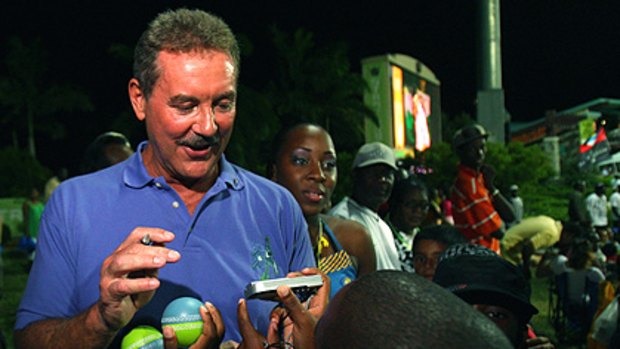 Sir Allen Stanford interacts with the crowd during a Twenty20 match last year.