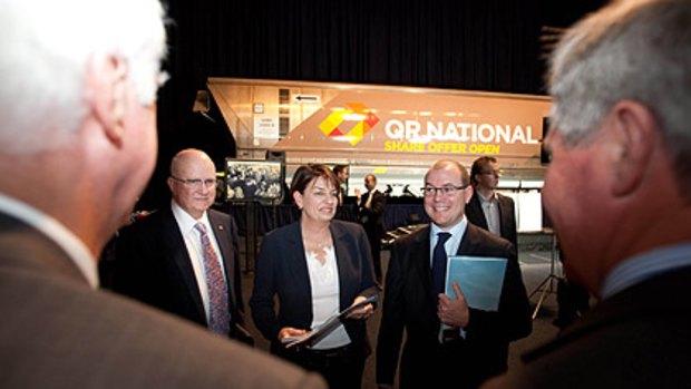 Treasurer Andrew Fraser, right, Premier Anna Bligh and QR Chairmam John Prescott at the announcement of QR National float details in Brisbane, October 10.