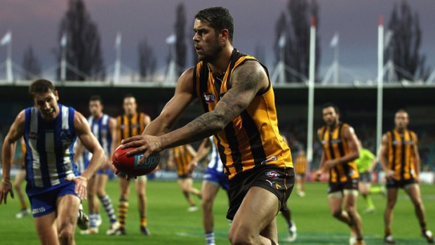 Lucky 13: Buddy Franklin eyes off the goals for one of his 17 scoring shots against North.