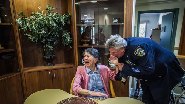 Uniting Care Mirinjani retirement village has granted a lifelong wish for resident Berenice Benson to meet a real New York city cop. Photo by Karleen Minney.
