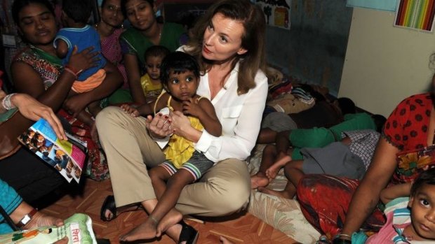 New career: Valerie Trierweiler plans to become a humanitarian campaigner. She visited a slum in Mumbai to promote the fight against child malnutrition in India.