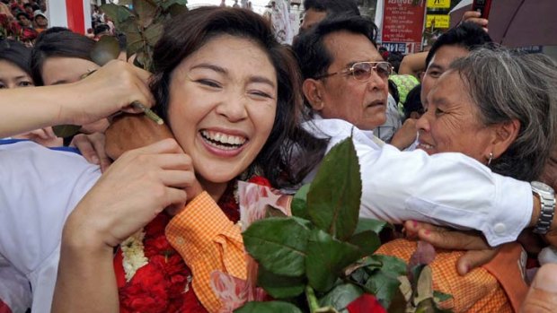 Popular appeal ... Yingluck Shinawatra campaigns in Bangkok in the run-up to tomorrow's general election.