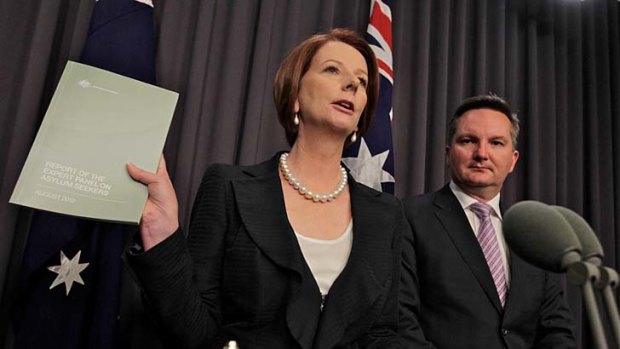 Lost face ... the Prime Minister, Julia Gillard, and the Immigration Minister, Chris Bowen.