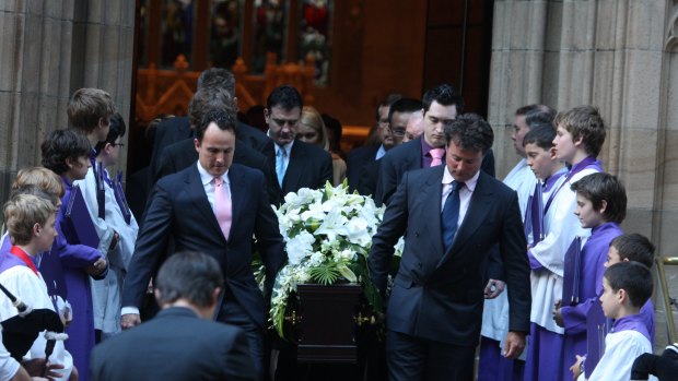 The coffin of David Catts is carried out of  St Andrew's Cathedral in Sydney.