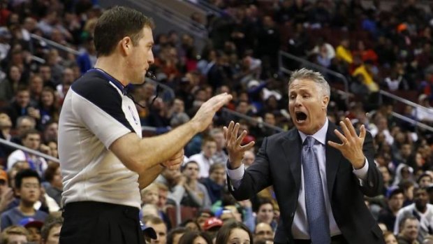 Philadelphia 76ers head coach Brett Brown yells for a timeout to referee Brent Barnaky during the game against the Indiana Pacers last Friday in Philadelphia. Indiana won 101-94.