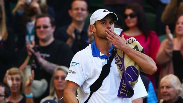 Andy Roddick of the USA blows a kiss to the crowd in what may be his last match at the All England championships.