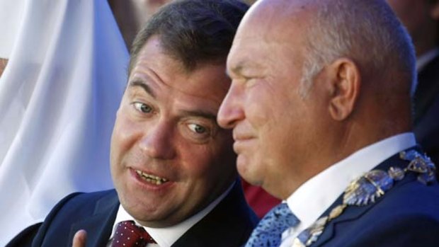 Attack ... President Dmitry Medvedev and former Moscow mayor Yury Luzhkov.