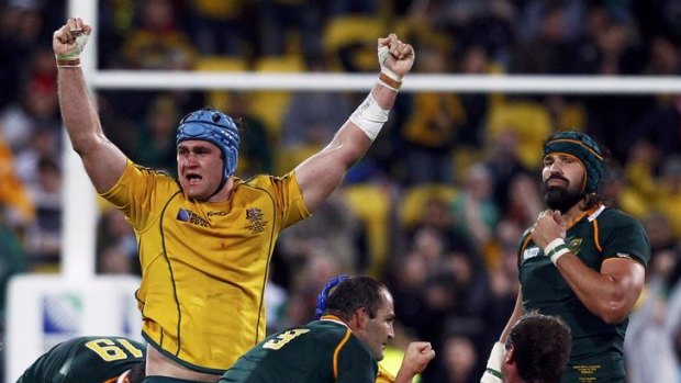Australia Wallabies captain James Horwill celebrates after winning their Rugby World Cup quarter-final match against South Africa.
