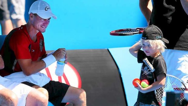 Lleyton Hewitt has a light moment with his son Cruz at a training session ahead of the Australian Open.