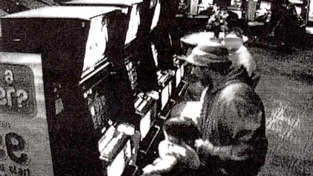 Minor problem: security footage captures the gambler with his child seated at a machine.