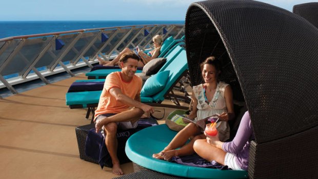 Laid back ... passengers enjoy cocktails on deck.