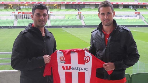 On board: Heart coach John Aloisi (left) with new signing Josip Tadic.