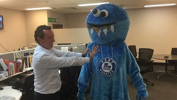 MarK McGowan with the Debt Monster, before copyright issues came back to bite Labor.