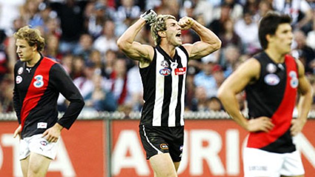 Travis Cloke celebrates a goal during Collingwood's thumping Anzac Day win in 2008.