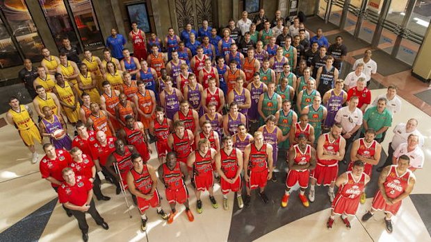 Big season ahead: Players and coaching staff of all NBL teams pose during the 2013/14 NBL Media Season Launch at The Entertainment Quarter in Sydney.