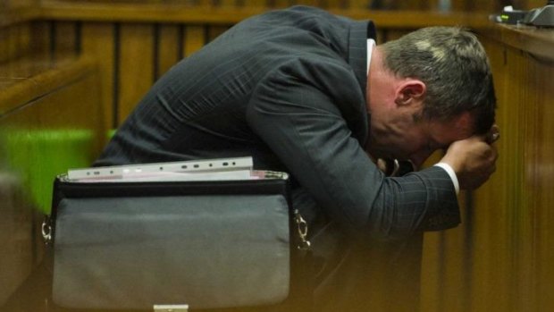 Oscar Pistorius listens to forensic evidence during his trial.
