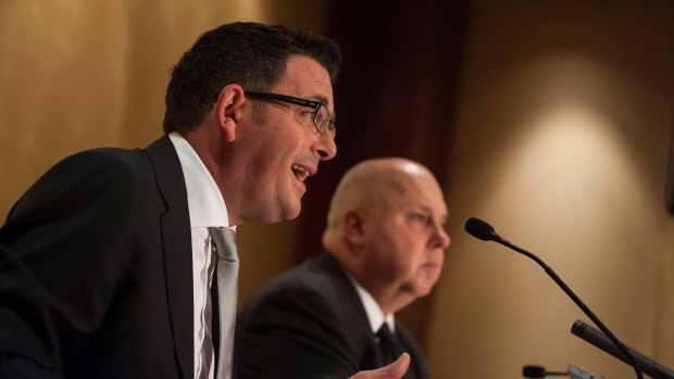   Victorian Premier Daniel Andrews with Treasurer Tim Pallas makes an announcement that the State Government will pay $339 million to East West Connect - the group contracted to build the East West Link -  during a press conference on April 15, 2015 in Melbourne, Australia.  