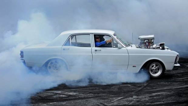 Smokin': Don Elphick in his 1971 Ford Falcon XY.