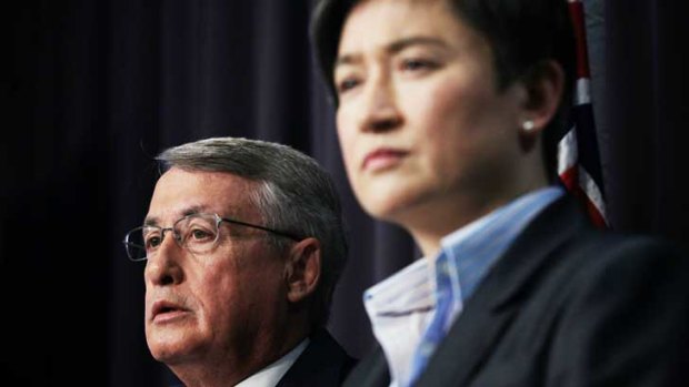A fall of $876 million in company tax receipts has shaken the finely focused surplus of the Treasurer and Finance Minister.