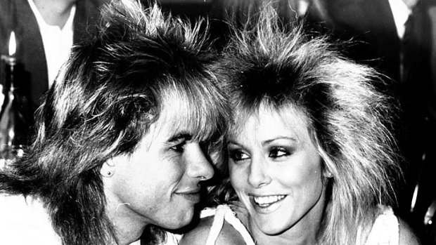 Embracing the eighties hair ... Warwick Capper and Joanne Norris.