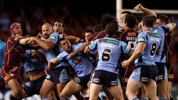 Football violence:  Blues and Maroons players fight during game one of the NRL State of Origin series