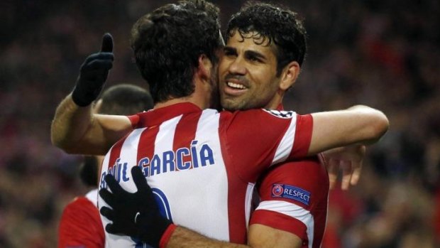 Raul Garcia and Diego Costa feel the love.