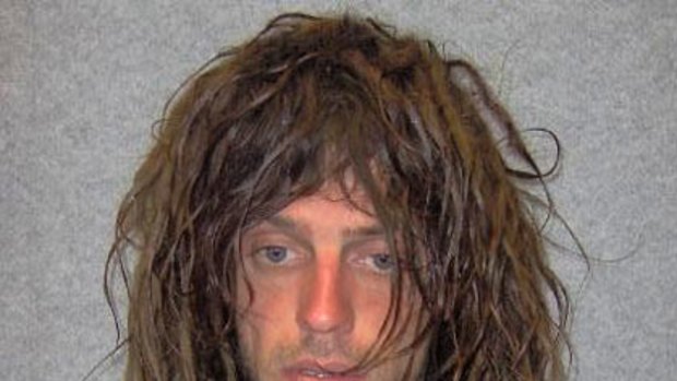 Police have launched a manhunt for James D'Zilva following the stabbing of a police officer in Healesville overnight.