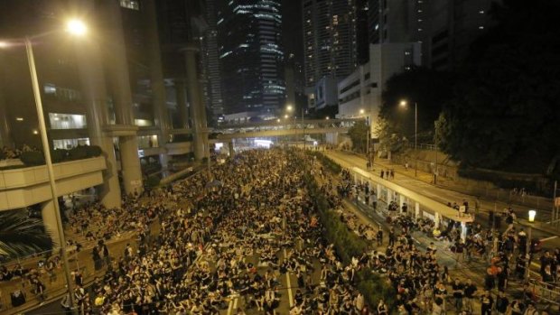 Protesters gather at a main streets in the central business district of Hong Kong.