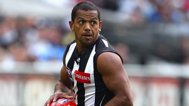 Leon Davis playing for Collingwood during the 2011 grand final.