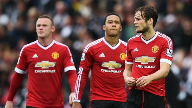 Pest problem: Wayne Rooney, Memphis Depay and Daley Blind of Manchester United.