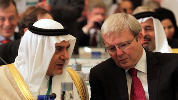 Saudi Arabia's former intelligence minister, Prince Turki Al Faisal, with Kevin Rudd.