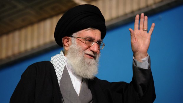 Iranian Supreme Leader Ayatollah Ali Khamenei waving to Iranian air force commanders in Tehran on February 7, 2013.